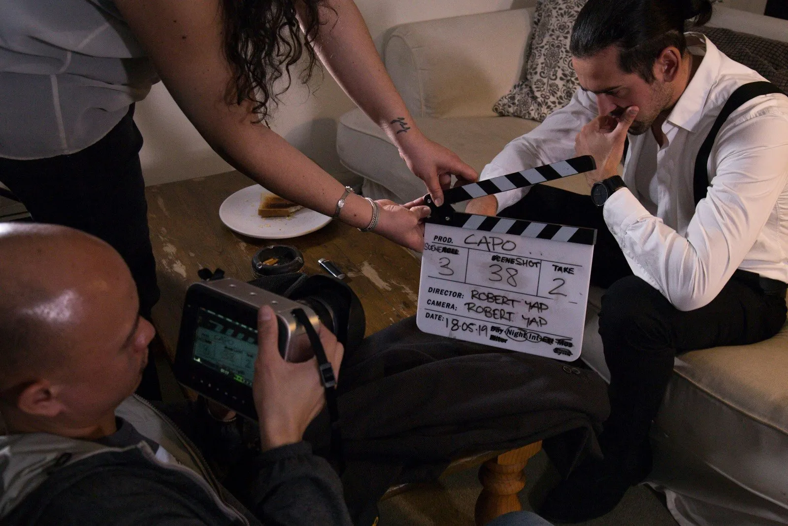 A film crew preparing an indoor shot.